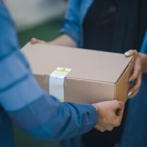 person giving brown box